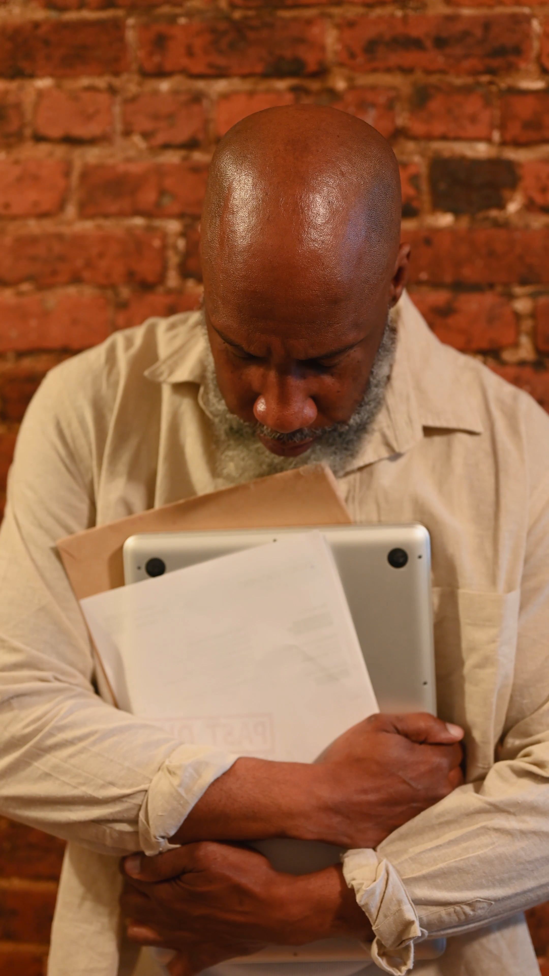 person-holding-a-laptop-looking-down-free-stock-video