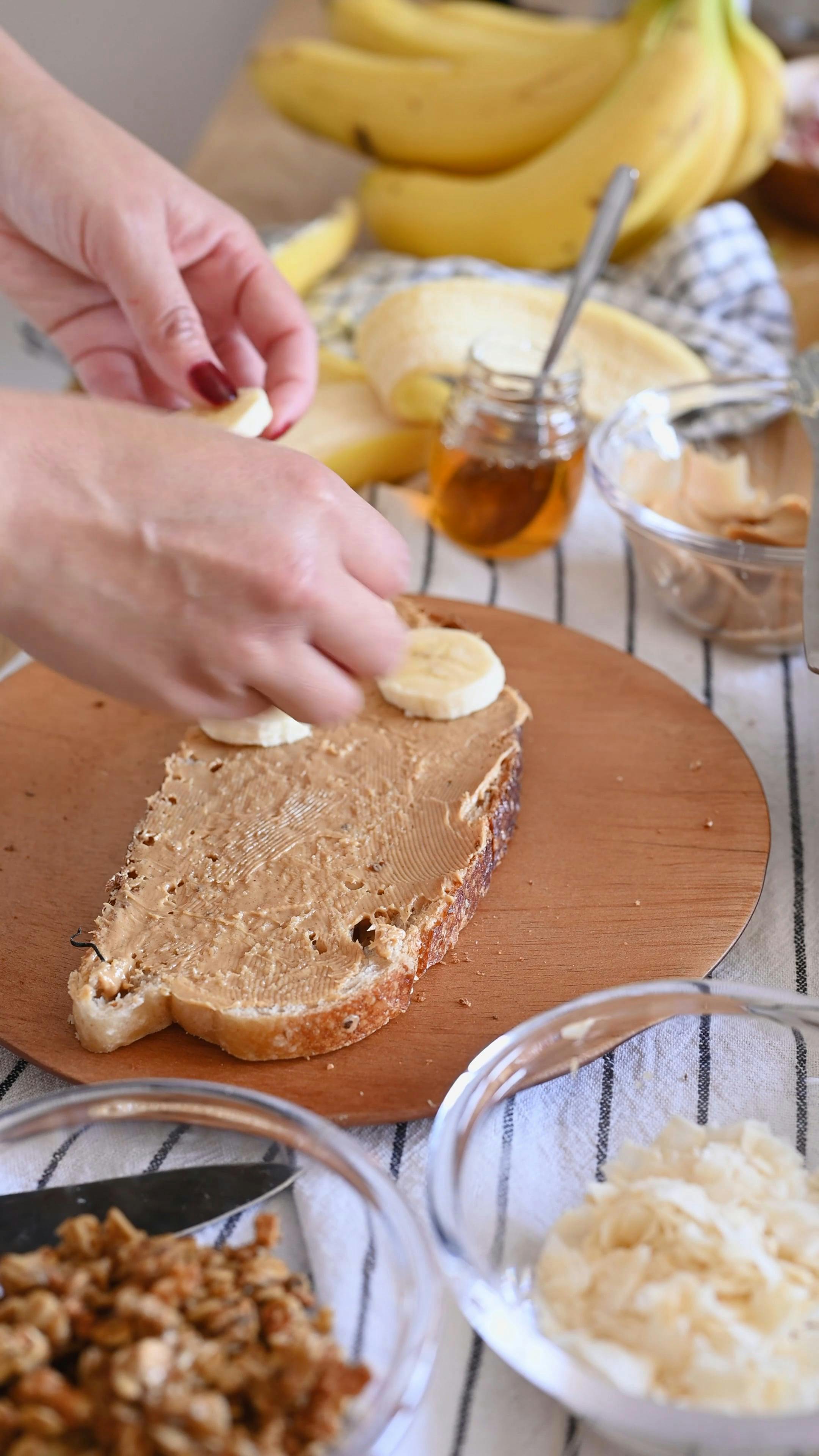 Person Putting Peanut Butter on Bread · Free Stock Video