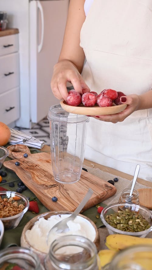 A Woman Making a Shake