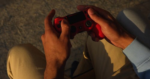 Person Using a Ps4 Controller