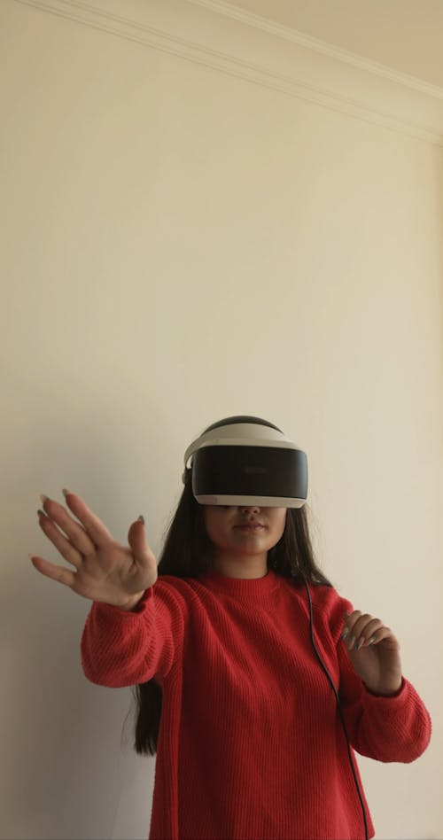 A Woman Wearing Virtual Reality Glasses