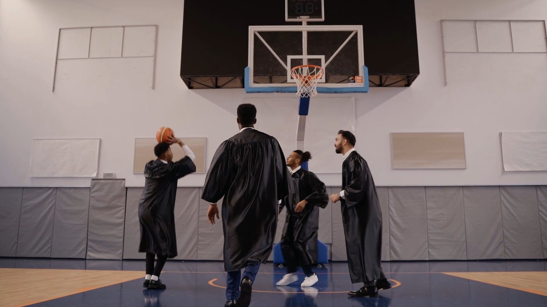 Men in Graduation Gown Playing Basketball · Free Stock Video