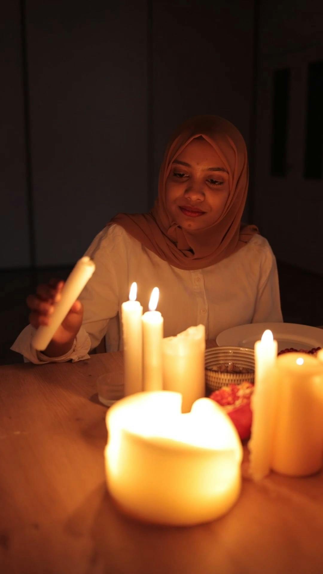 Burning Candles on a Blurry Background · Free Stock Video