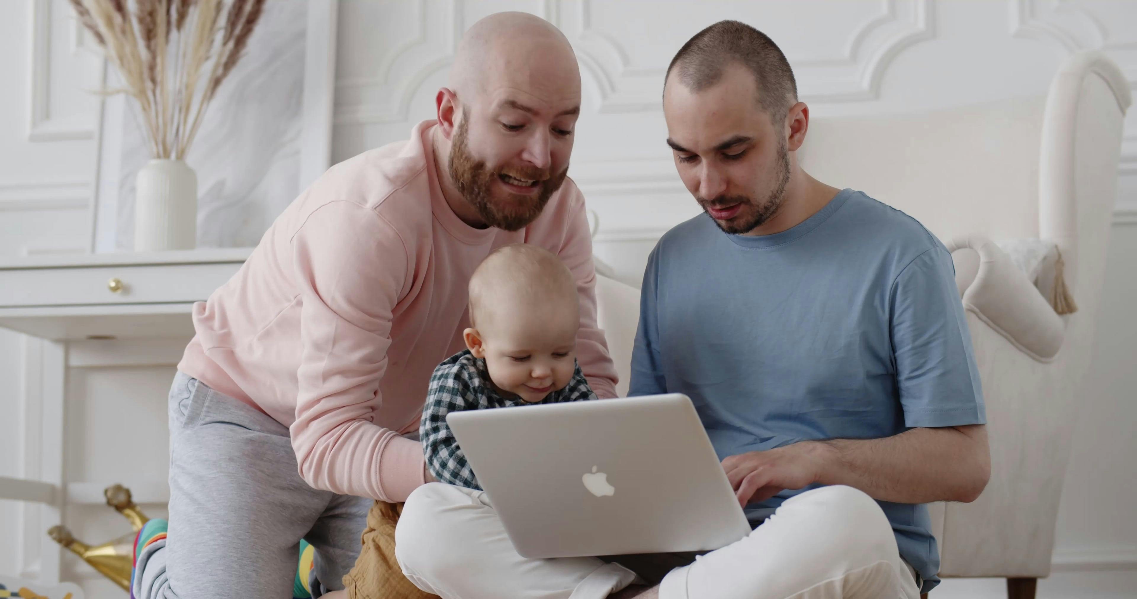 Dads Working From Home and Taking Care of Baby · Free Stock Video