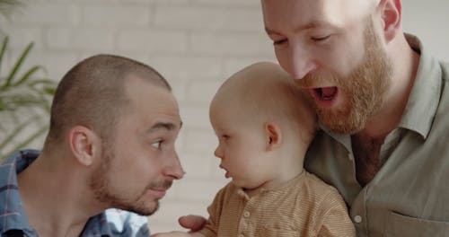 Couple Playing with their Baby