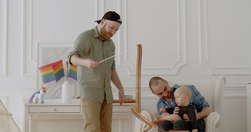 A Couple Playing with a Baby