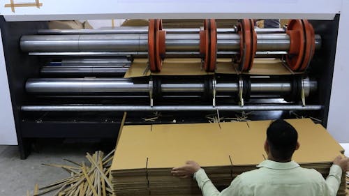 A Man Working in the Factory