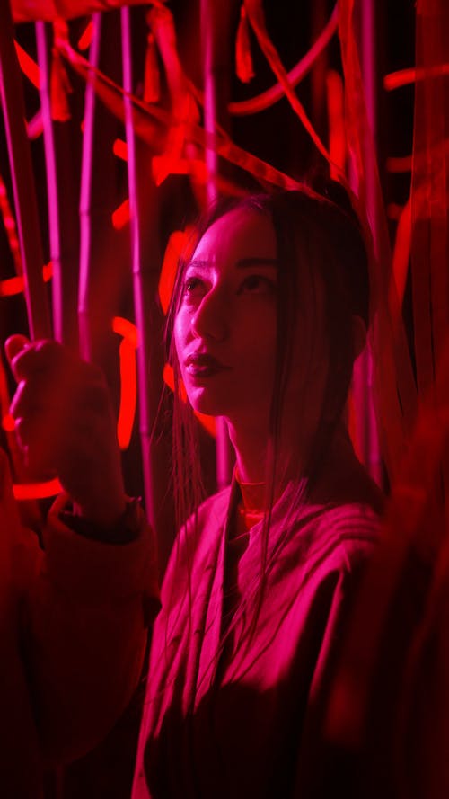 Woman in Kimono Under Red Light