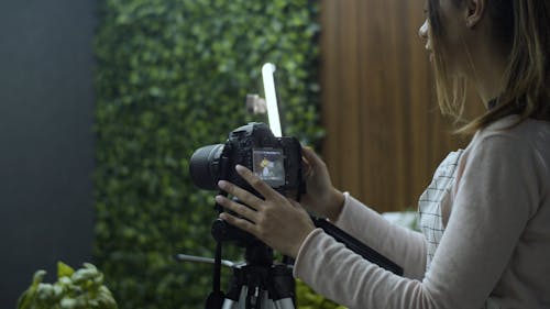 A Photographer and a Model during a Photo Session 