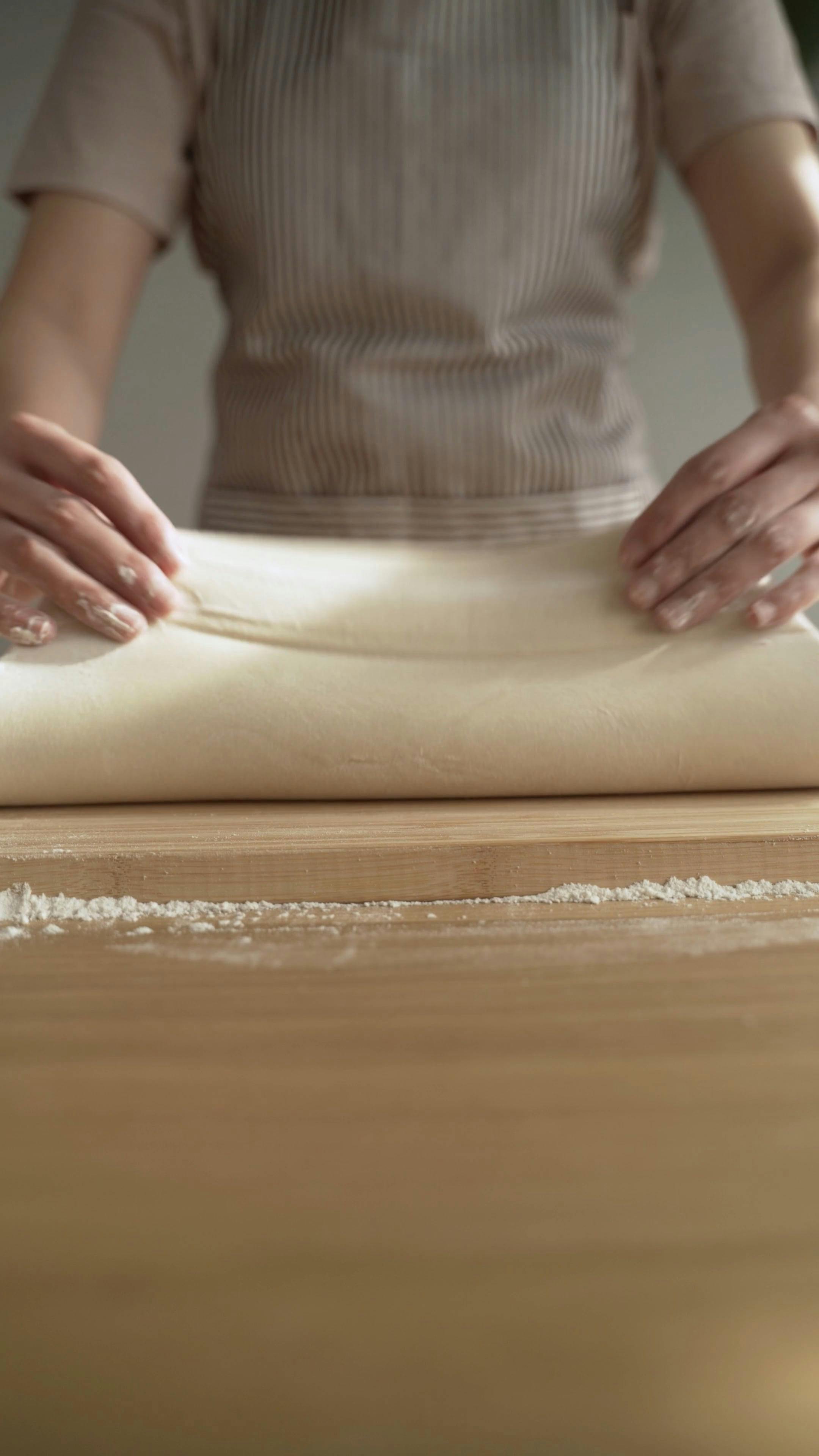 Close Up Shot of a Person Kneading a Dough · Free Stock Video