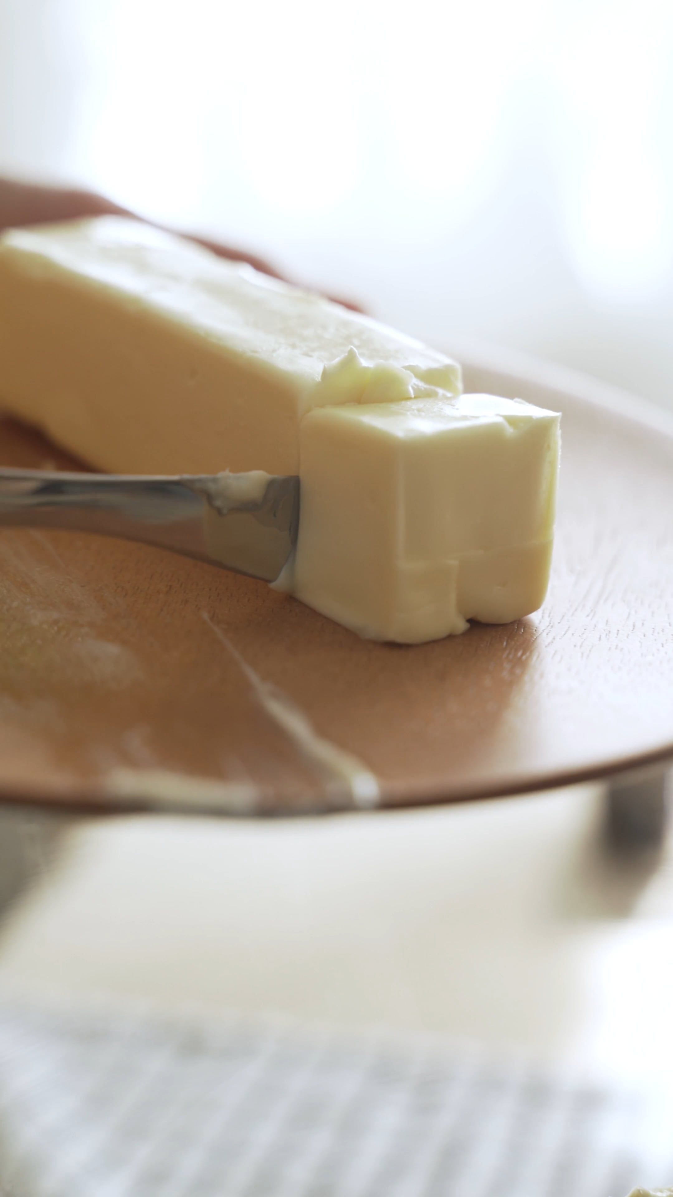Close Up Shot Of A Person Cutting Butter Free Stock Video close-up-shot-of-a-person-cutting-butter-free-stock-video