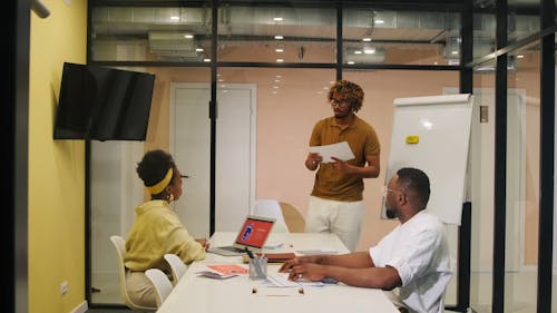 Man Presenting in the Meeting Room