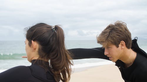 Young Surfers Looking at the Ocean