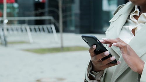 Close Up of a Woman using a Cellphone