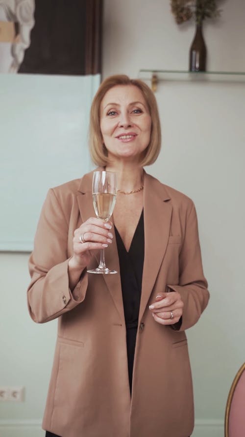 A Woman Drinking a Glass of Wine