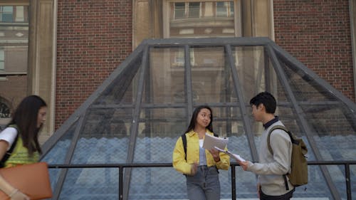 Small Group of Students Gathering Outdoors