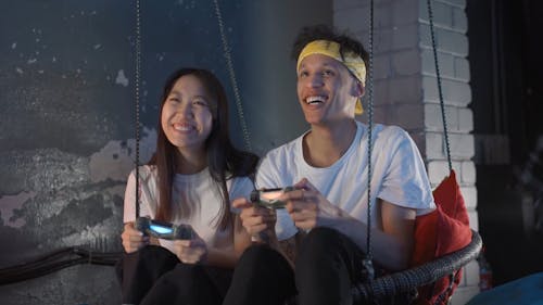 People Playing Game Console Together