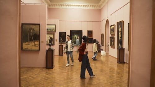 People Roaming Around a Museum