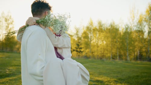 Man Carrying Woman