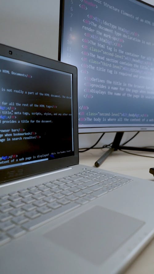 A Man Using a Computer in the Office