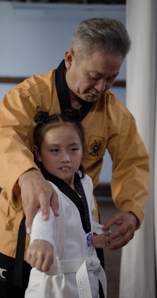 Girl Tying Her Taekwondo Belt Free Stock Video Footage, Royalty-Free 4K &  HD Video Clip