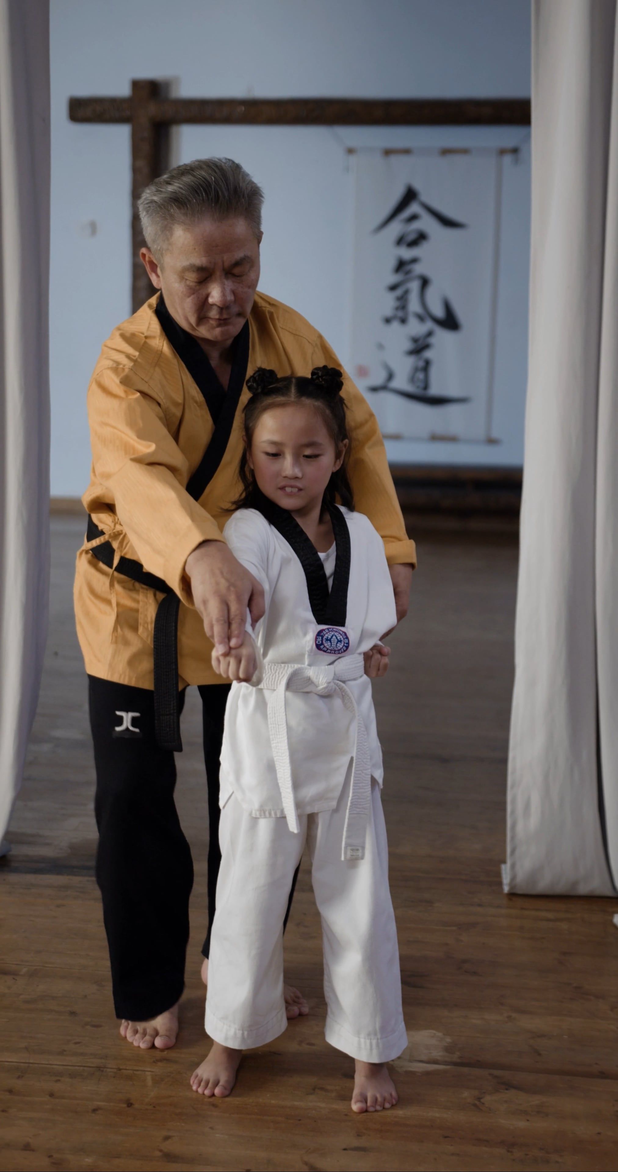 Man Teaching Taekwondo to a Little Girl · Free Stock Video