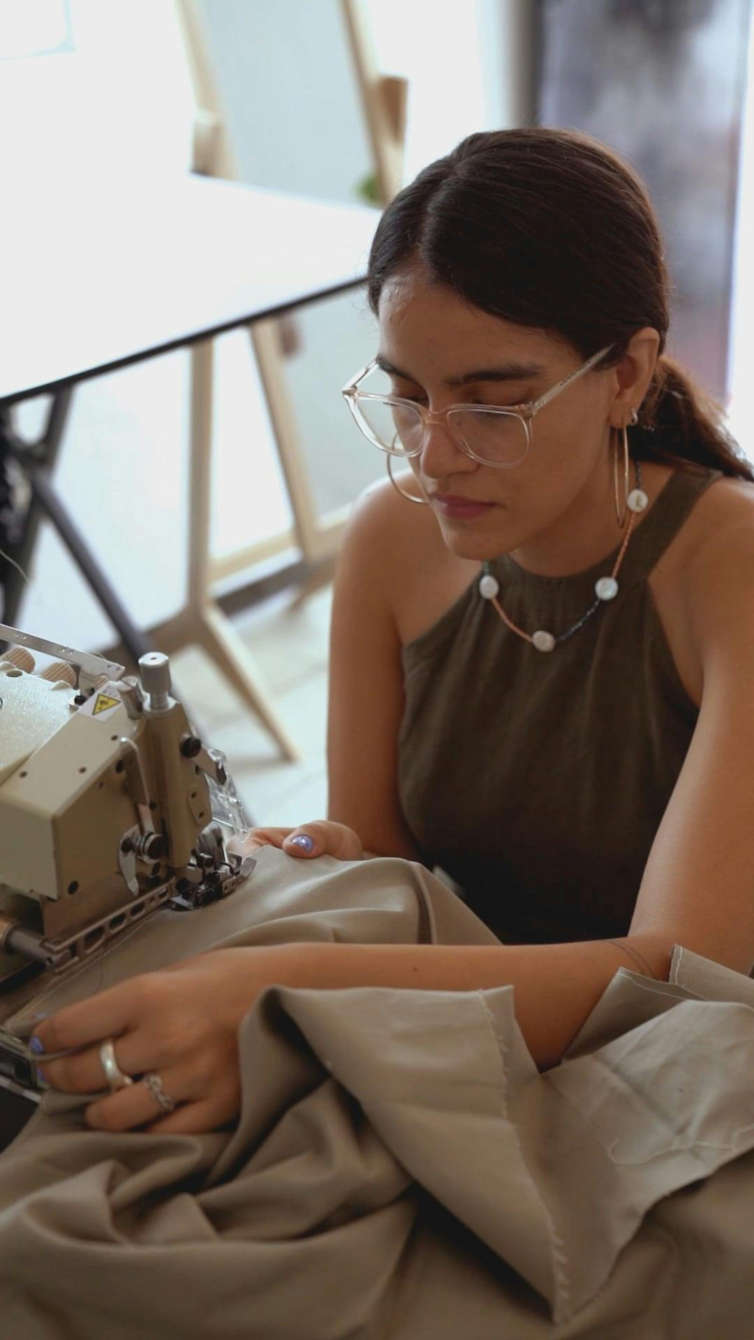 A Seamstress Using A Sewing Machine · Free Stock Video