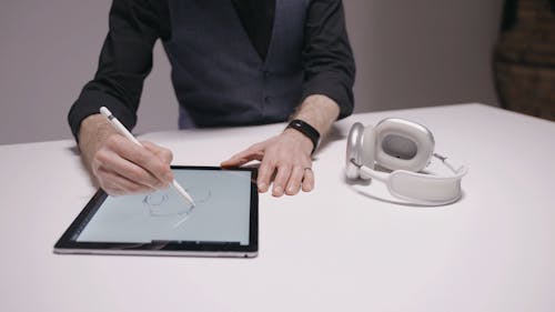 A Designer Working with a Digital Tablet 