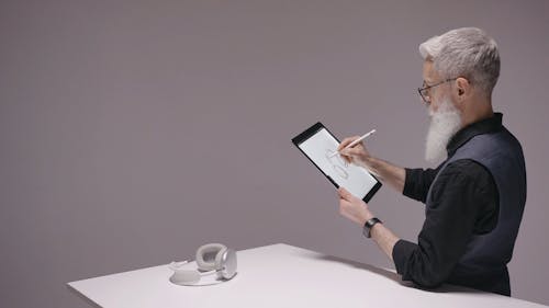 Man Using a Tablet at Work