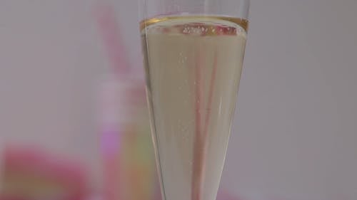 Close Up View of Champagne on a Glass