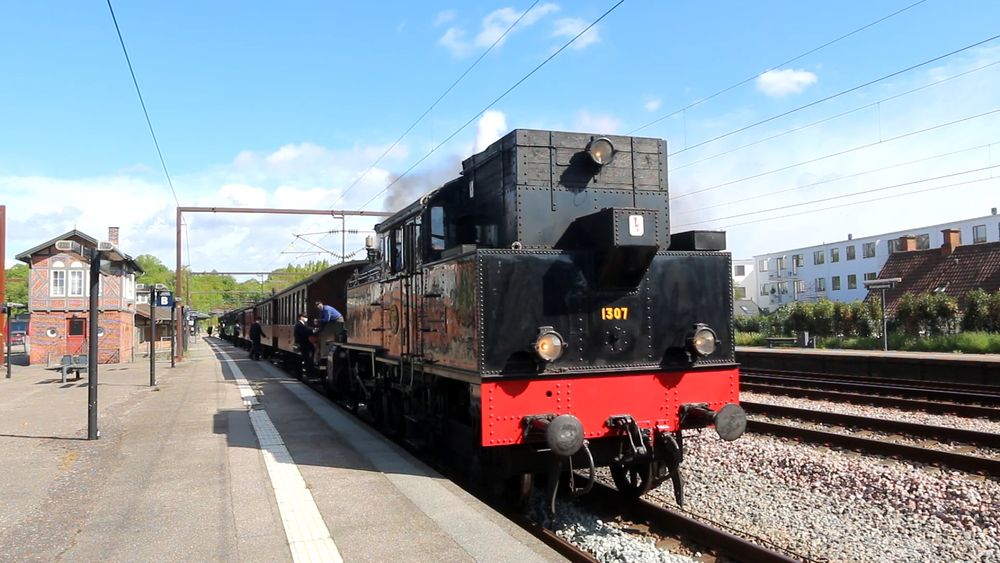 Low Angle View of Steam Train Leaving Station · Free Stock Video