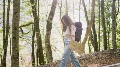 Woman Walking in the Woods