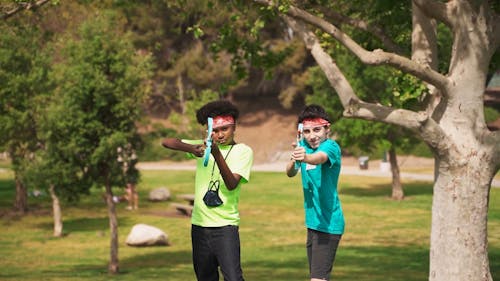 Boys Playing Bow and Arrow