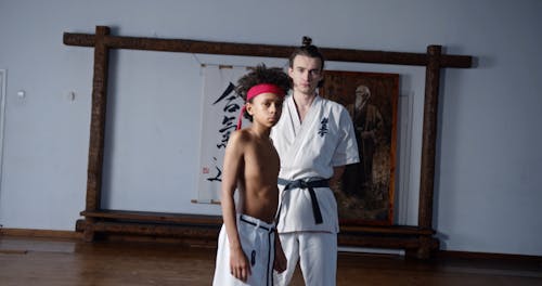 A Young Student with his Karate Trainer