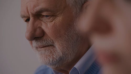 An Elderly Man Crying