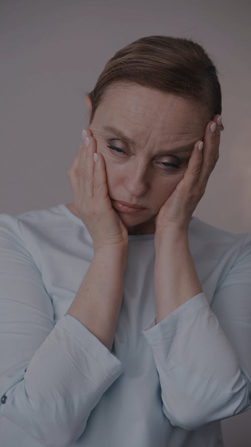 An Elderly Woman Feeling Sad