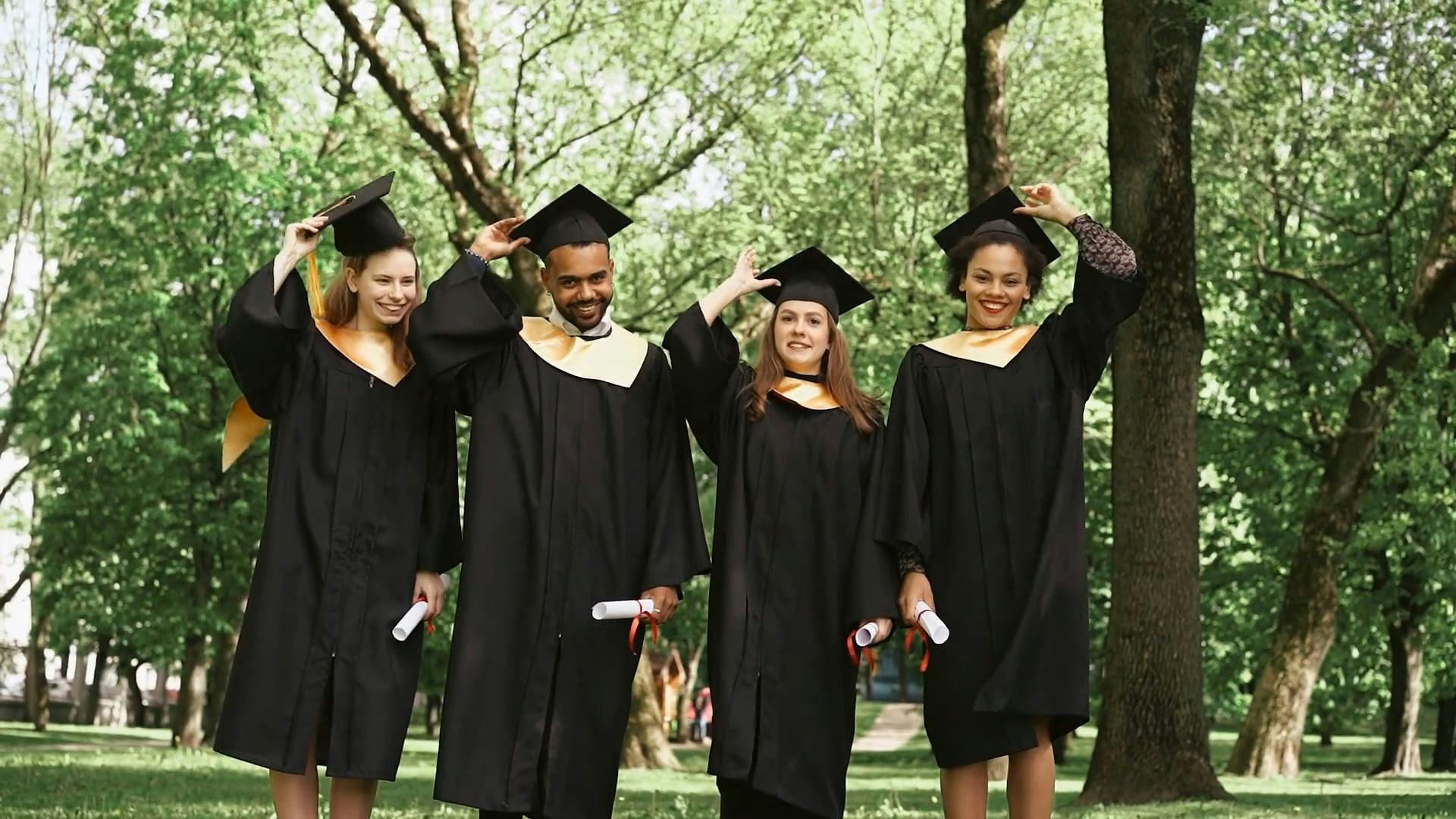 Graduates Throwing Academic Cap In The Air · Free Stock Video