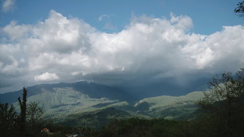 Clouds Moving Over Mountains