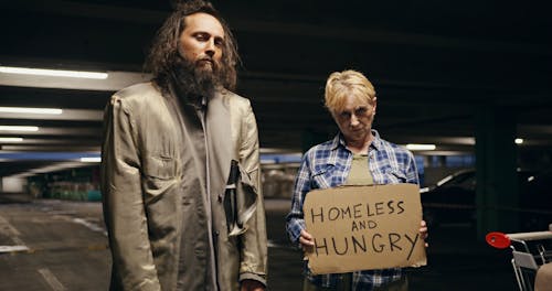 Homeless Man and Woman Asking For Food