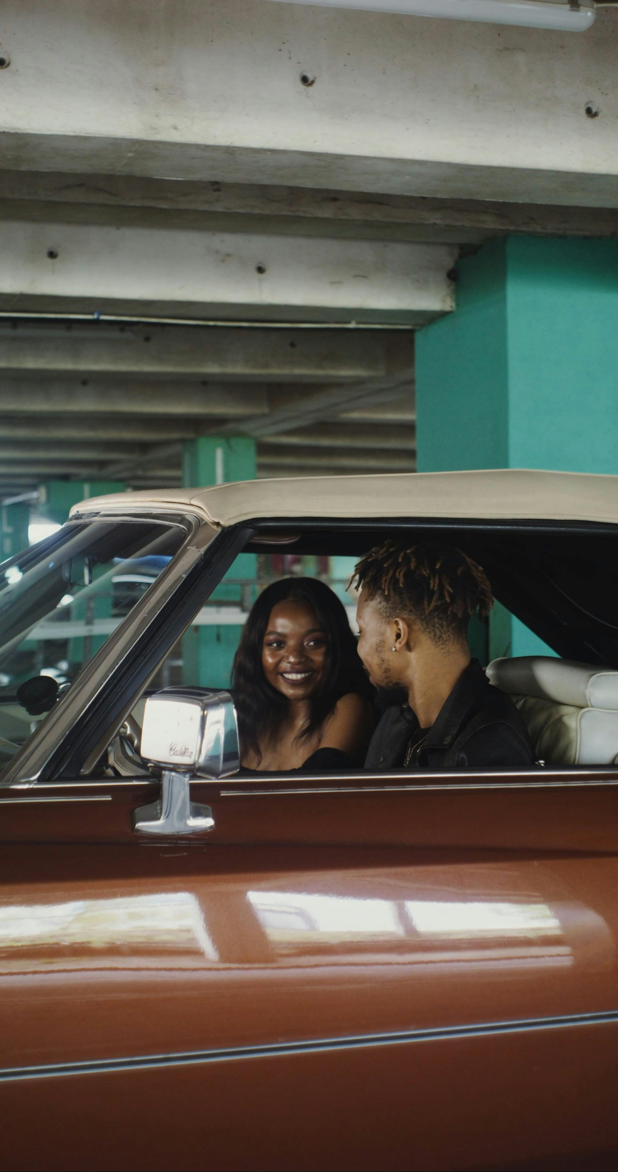 Happy Couple Cuddling in the Car Free Stock Video Footage, RoyaltyFree 4K & HD Video Clip