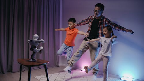 Family Imitating a Robot Dancing