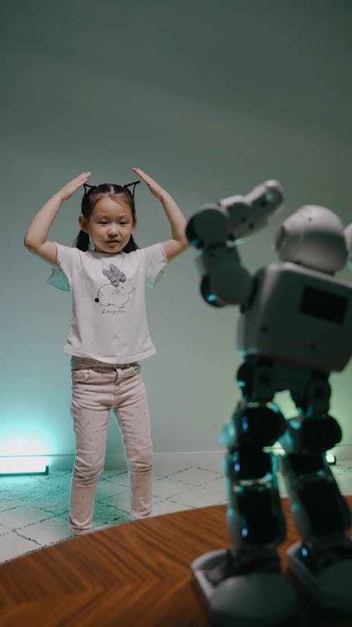 Girl Dancing With A Robot