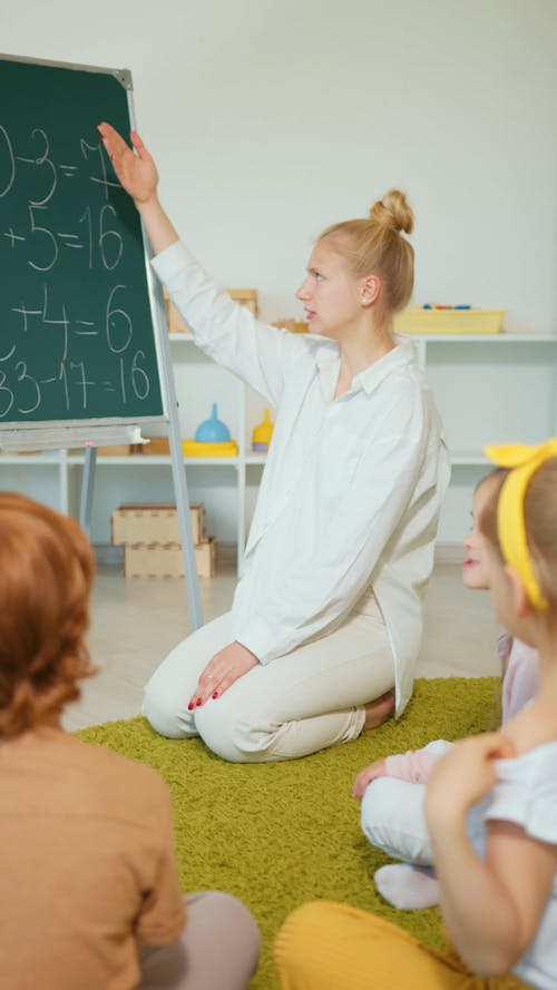 Female Teacher Explaining Her Lesson