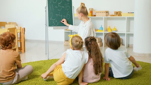 Female Teacher Teaching Mathematics