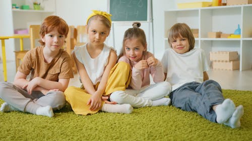 Children Sitting in a Classroom 