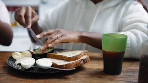 A Person Making Avocado Toast