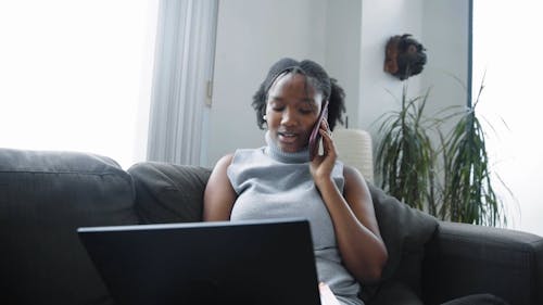 A Woman Talking using a Smartphone