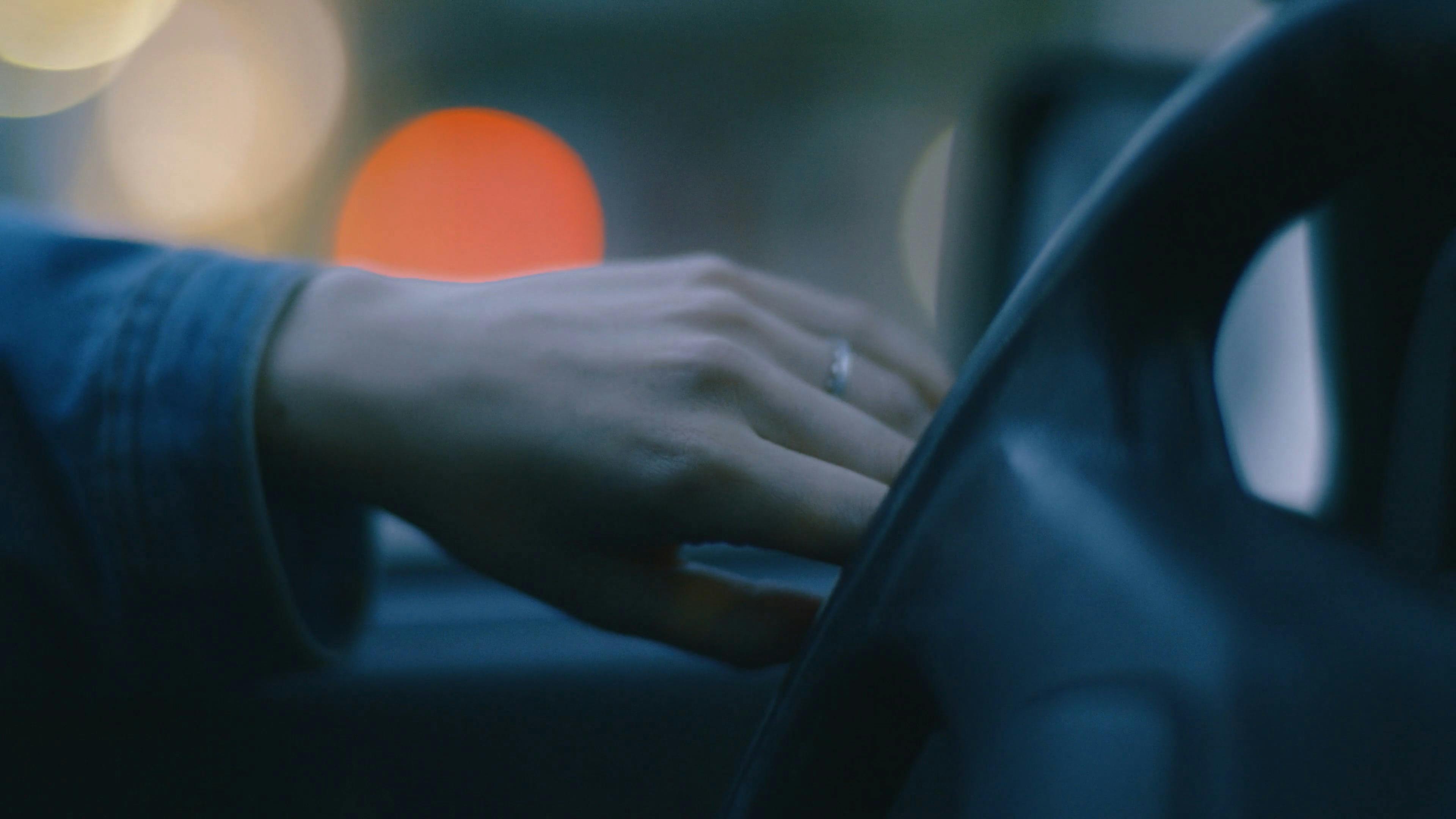 A Person Tapping Fingers on a Steering Wheel Free Stock Video Footage