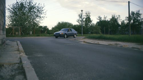 A Young Man Driving a Car