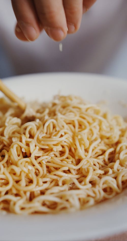 Man Eating Noodle